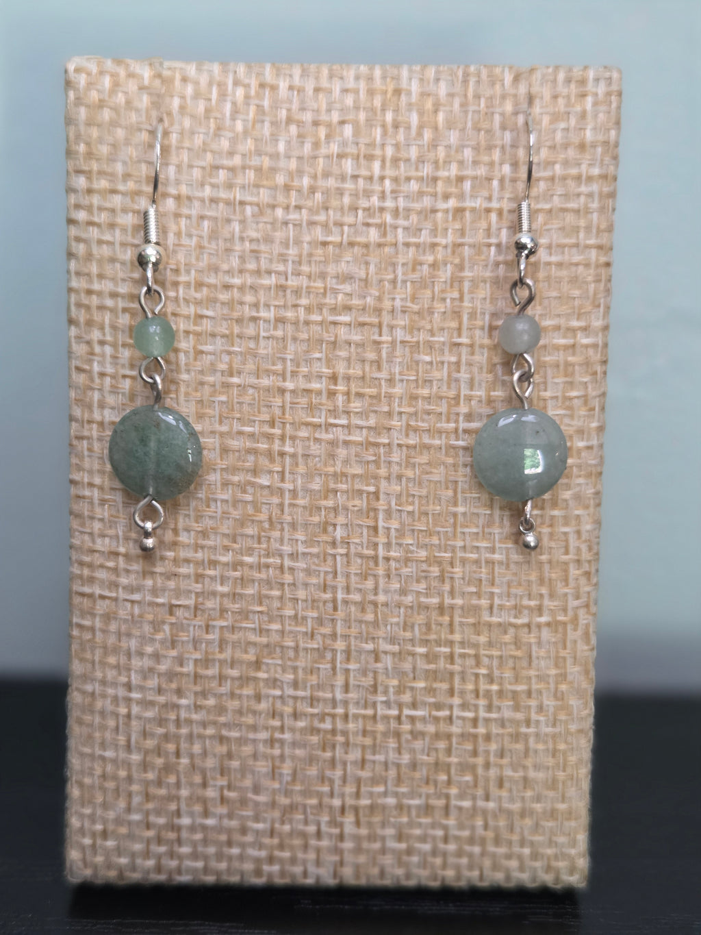 Close-up of genuine green aventurine bead earrings in silver-tone findings
