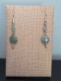 Close-up of genuine green aventurine bead earrings in silver-tone findings
