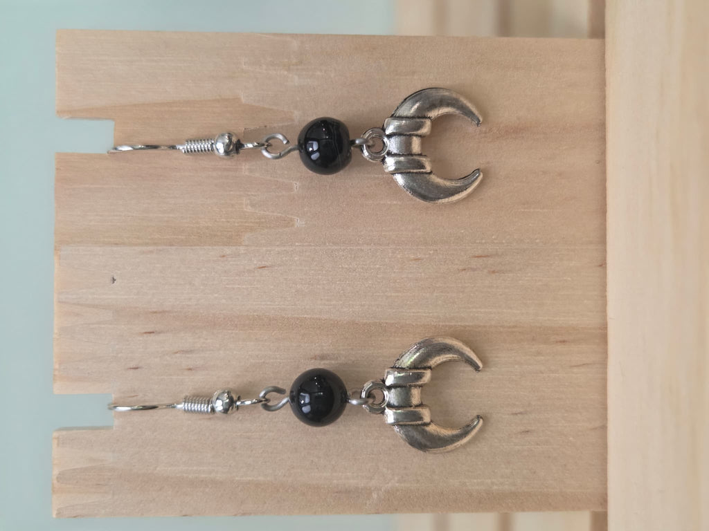Black onyx beaded earring with silver-tone banded crescent moon charm