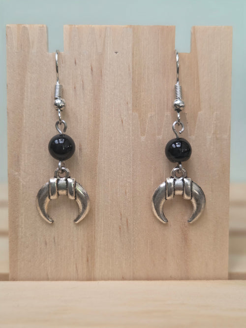 Black onyx beaded earring with silver-tone banded crescent moon charm